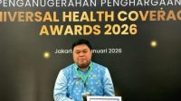 Wakil Bupati Kepulauan Sangihe, Tendris Bulahari menerima penghargaan Universal Health Coverage (UHC)/foto:ist