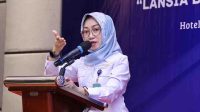 Pelaksana Tugas Direktur Jenderal Pembinaan Penempatan Tenaga Kerja dan Perluasan Kesempatan Kerja (Binapenta dan PKK), Estiarty Haryani bawakan sambutan (hms)